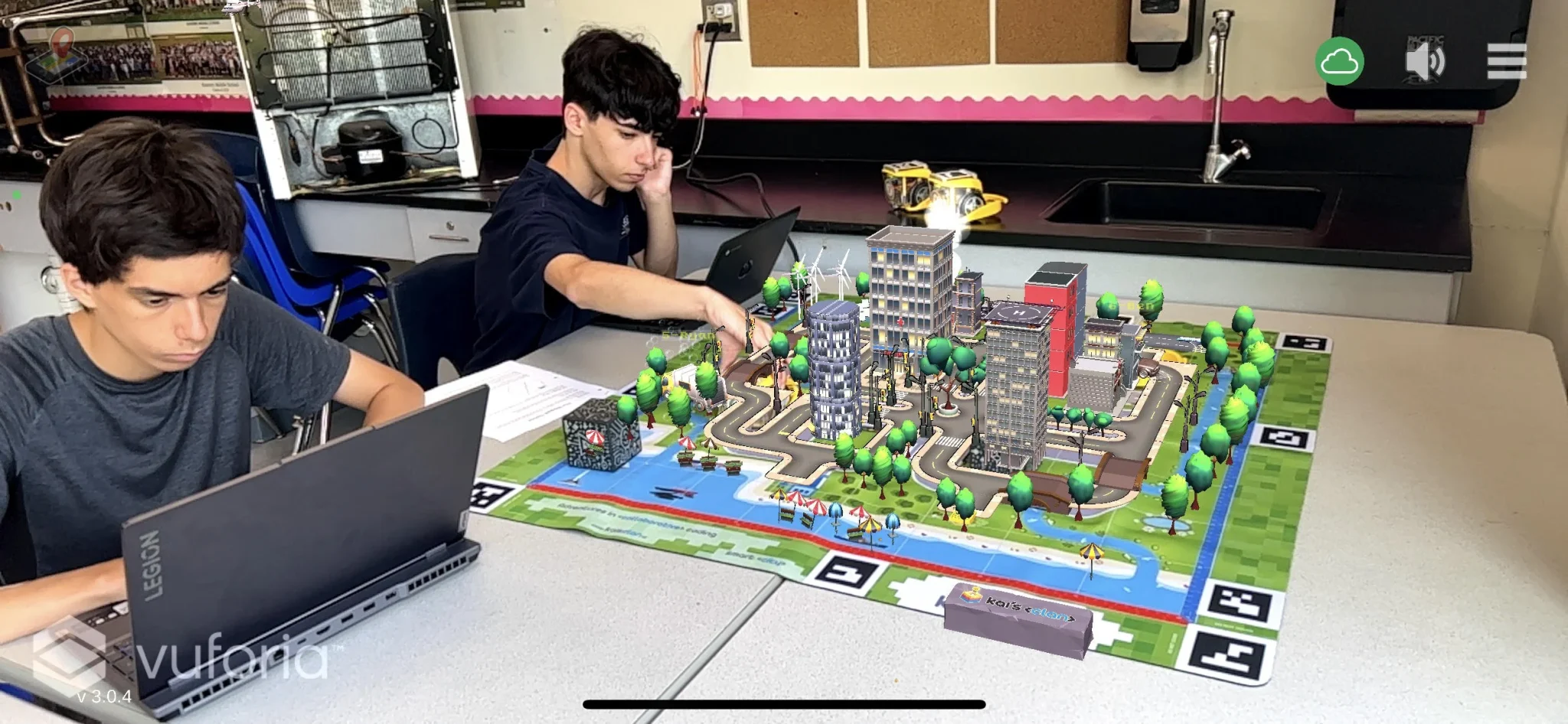 Students Coding Kai's Clan Alongside AR View