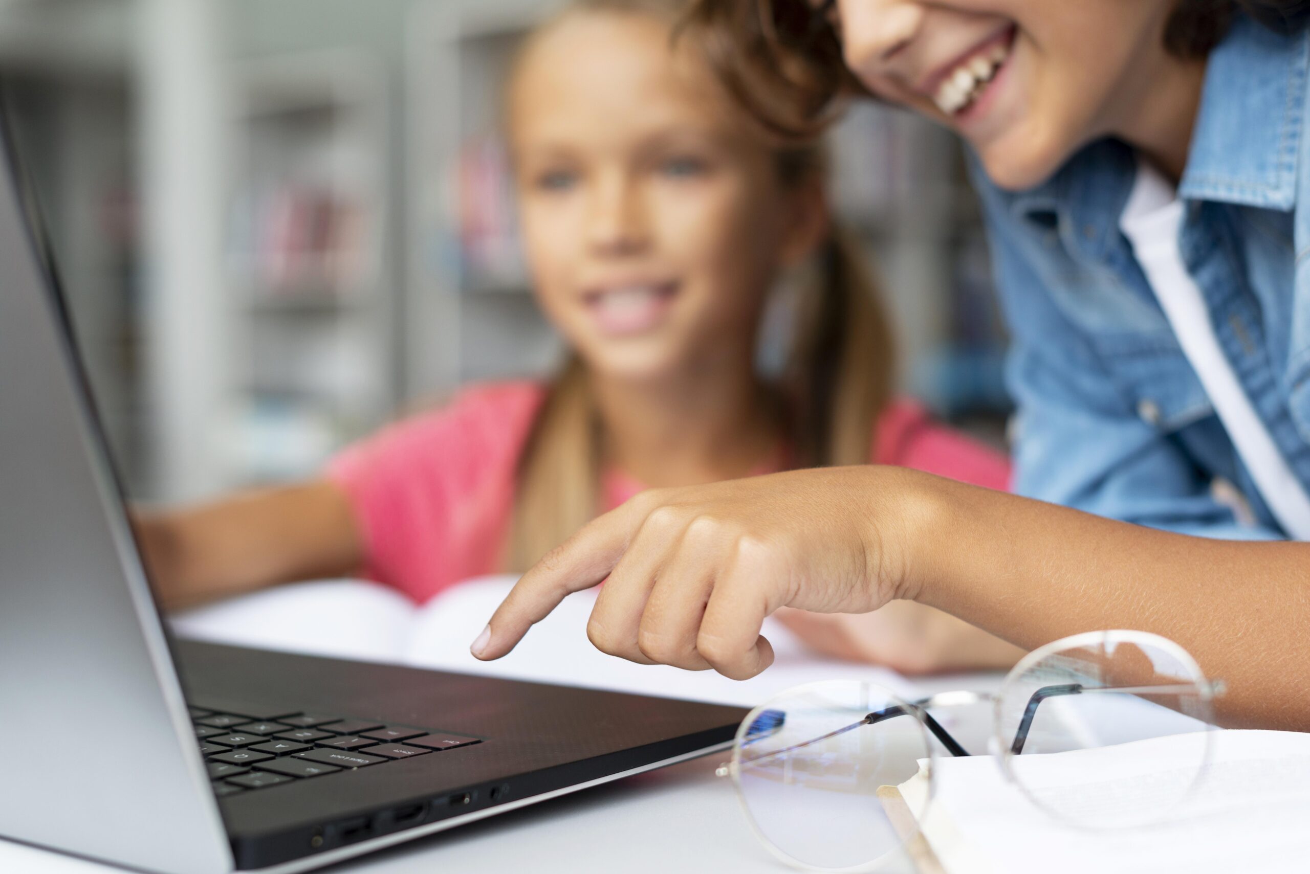 Students Doing Homework on a Laptop