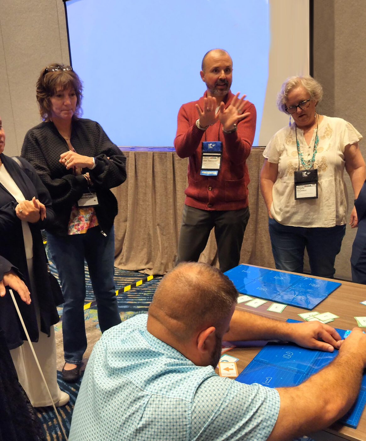 Ben Davisson leading a KaiBot workshop with teachers who are blind and/or have low vision, who work in special education classrooms.